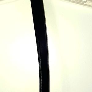 Mens Black belt with silver buckle size 34 bought at Sears new with tag